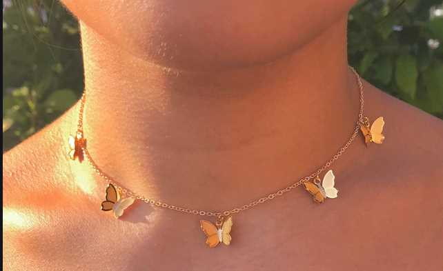 gold butterflies and dainty necklaces